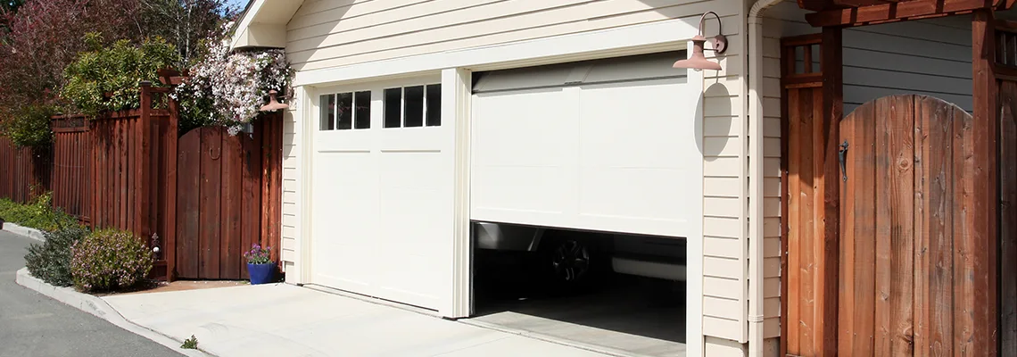 Fix Metal Garage Door Jerking in Streamwood, Illinois